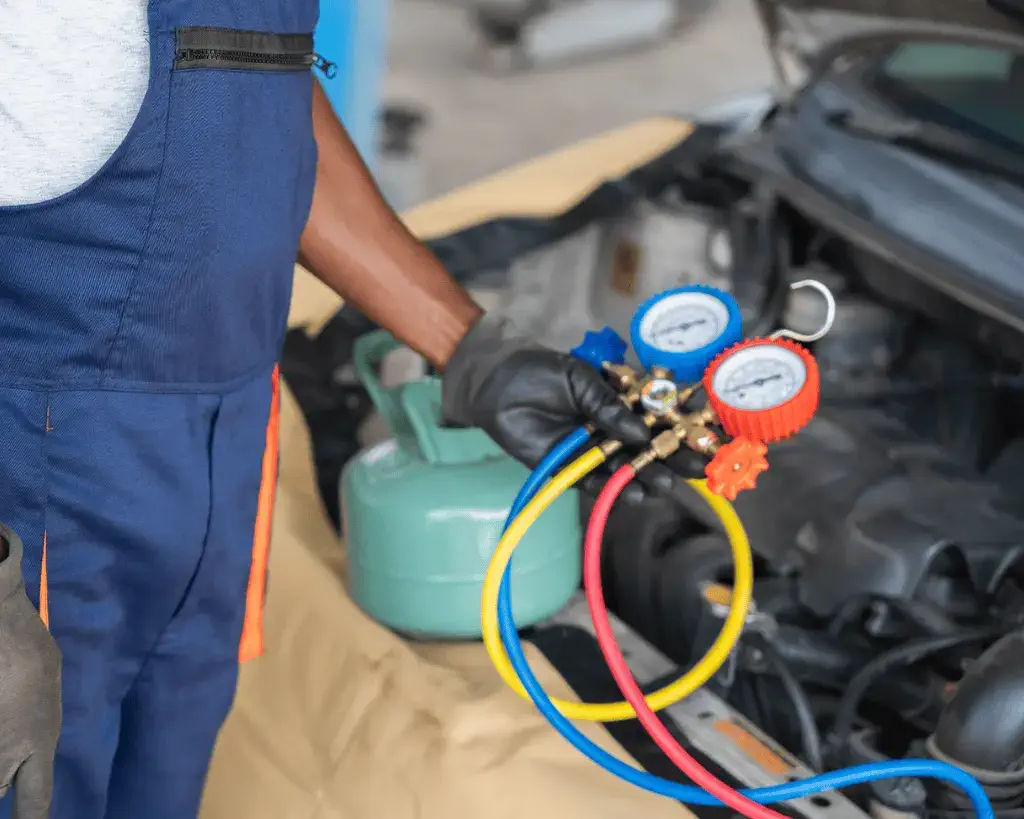 AC refrigerant recharge service on vehicle