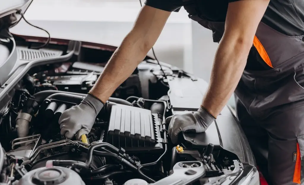 Randy working on a vehicle at University Auto Service